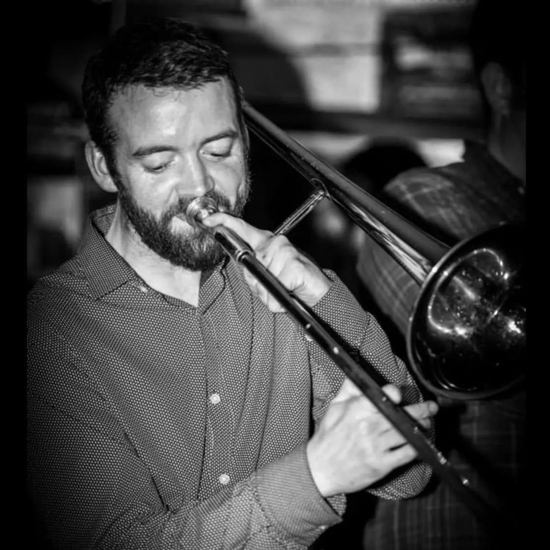 Band leader Eoghan Kelly playing his trombone